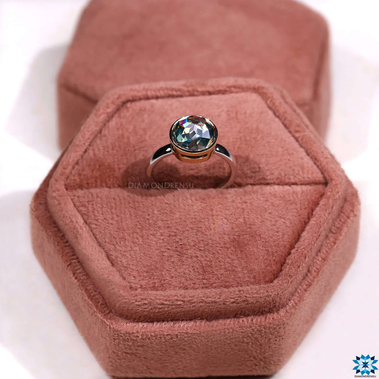 A timeless solitaire engagement ring with a sleek, minimalist design for an understated elegance.