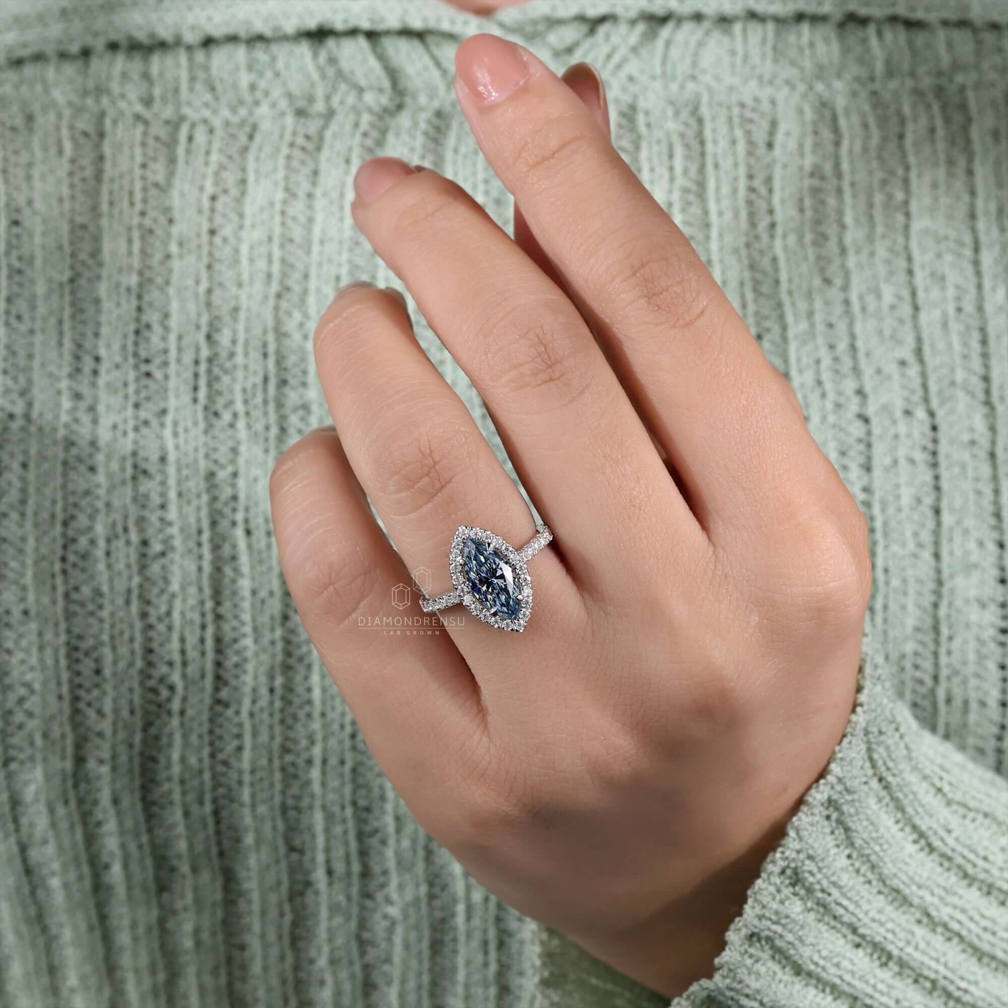 marquise cut diamond halo engagement ring
