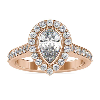 Pear engagement ring with a stunning halo and pave accents.