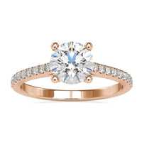 Cathedral setting engagement ring featuring a Lab Grown Diamond and a handmade ring design.