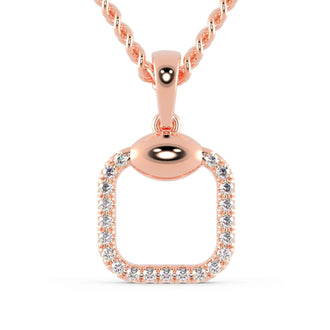 The cushion cut diamond pendant shines with brilliant clarity.