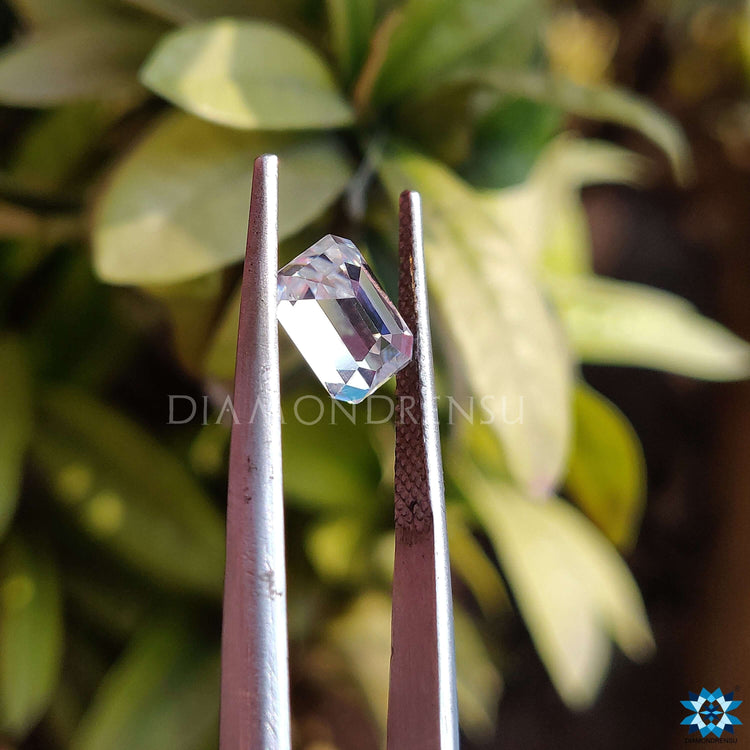 1.35 carat Moissanite crafted in emerald step cut for clarity and structure.