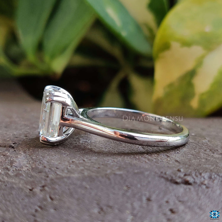 Refined cathedral emerald cut ring perfect for proposals.