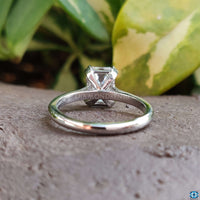 Dazzling emerald cut engagement ring crafted with care.