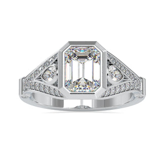 Emerald shaped engagement ring with split shank design in white gold