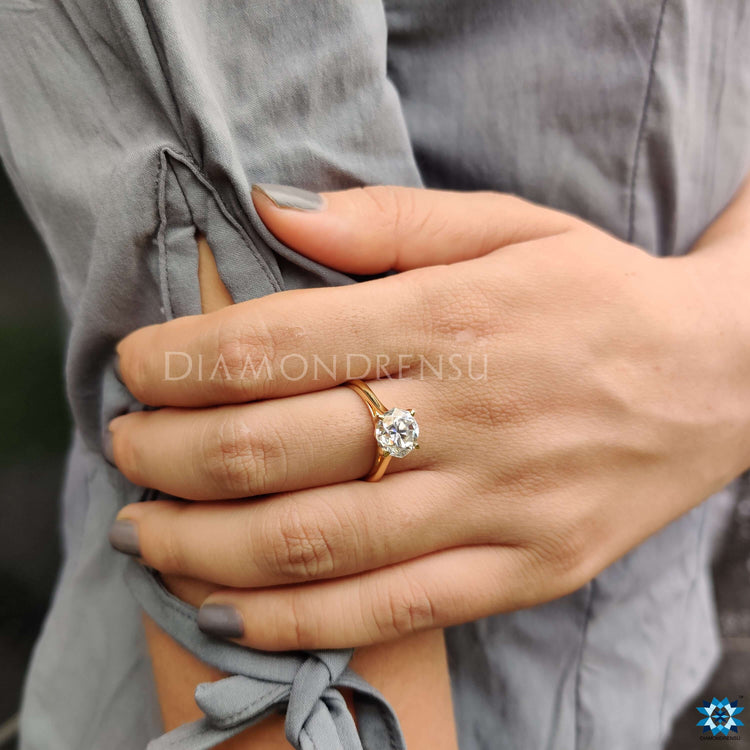 Classic four prong solitaire engagement ring designed for a timeless, elegant look.