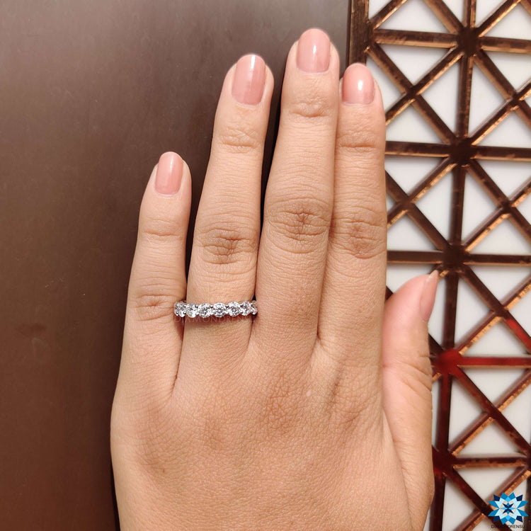 Round moissanite ring in a beautiful scallop pave set, perfect for daily wear or special occasions.