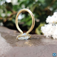 A pear-shaped engagement ring featuring a 3-prong setting ring design, ideal for modern brides.