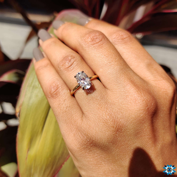 A sophisticated 4 prong diamond ring showcasing a brilliant-cut diamond.
