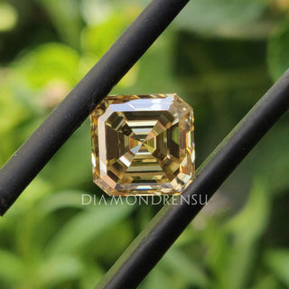 Champagne Moissanite available as Asscher Cut Moissanite in 1.84 carat moissanite.