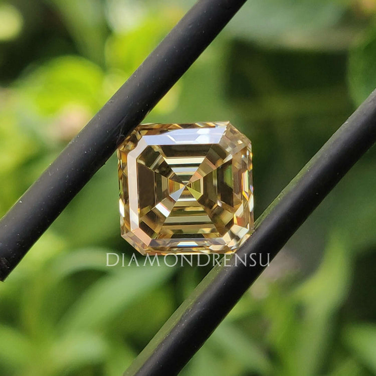 Champagne Moissanite available as Asscher Cut Moissanite in 1.84 carat moissanite.