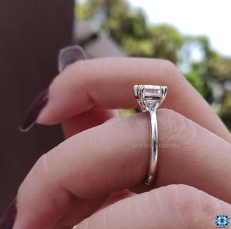 Moissanite emerald cut ring for a modern bride with a classic touch.
