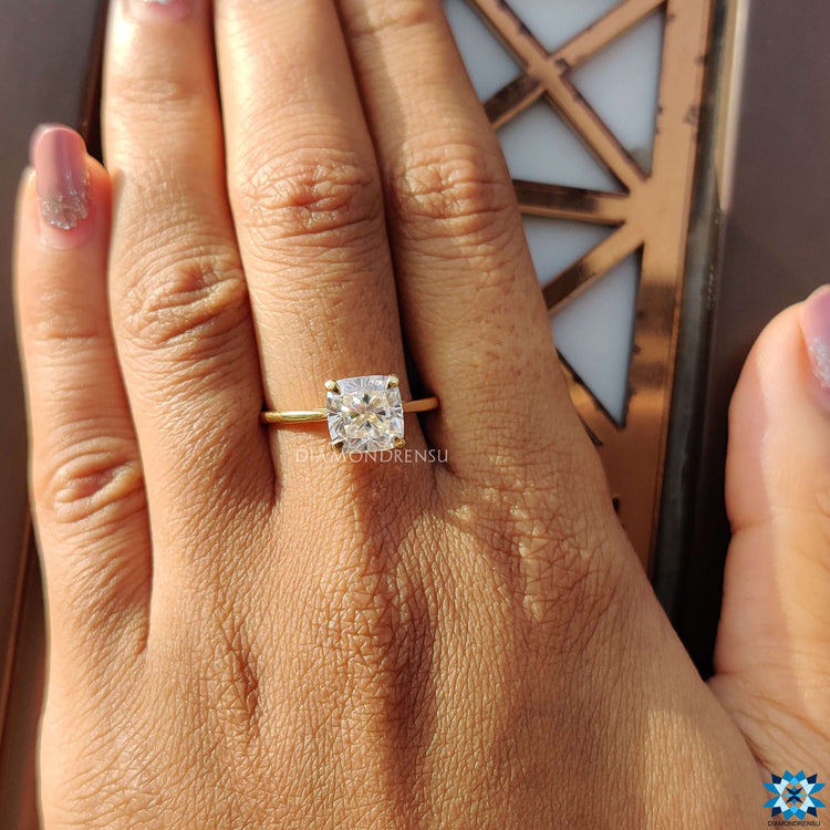 A gold solitaire engagement ring crafted with sophistication in mind.
