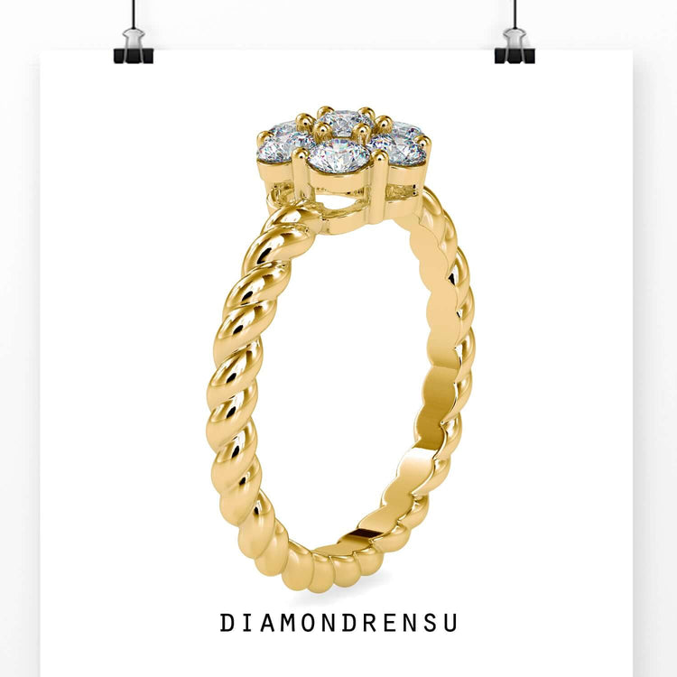 Diamond cluster ring featuring a handmade jewelry design in yellow gold