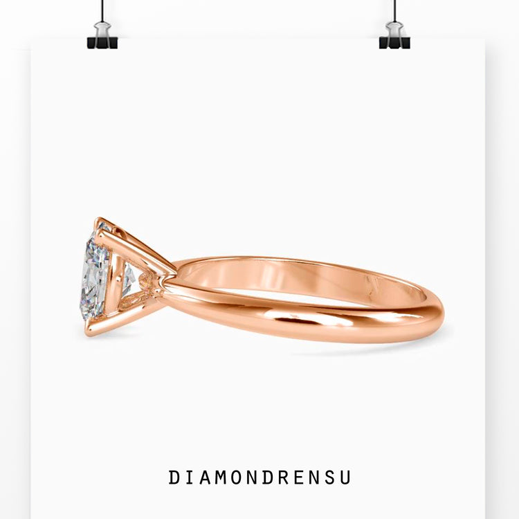 Handmade ring featuring an oval solitaire diamond, crafted with care.