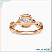 Engagement ring with pave details and twisted diamond band.