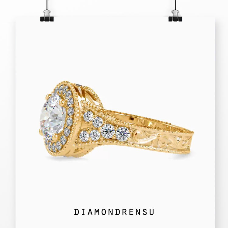 Vintage engagement ring with a round cut diamond and intricate split shank.