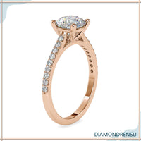 Cathedral style engagement ring with a four prong ring setting and Lab Grown Diamond.