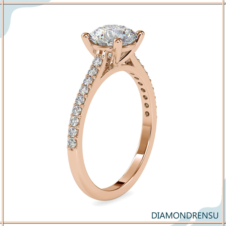 Cathedral style engagement ring with a four prong ring setting and Lab Grown Diamond.