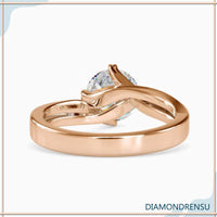 Diamond solitaire ring round with a sleek and modern design.
