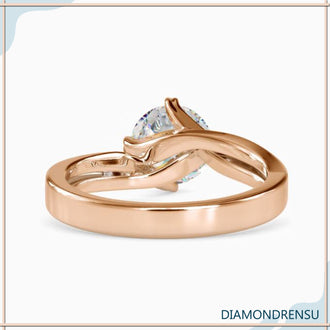 Diamond solitaire ring round with a sleek and modern design.
