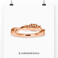 3 diamond ring with a twisted engagement ring setting, perfect for a contemporary look.