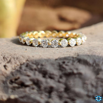 Full eternity wedding band with stunning prong details.