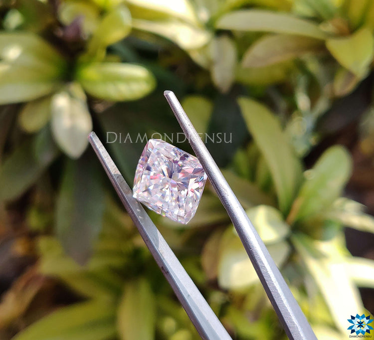 Loose moissanite in cushion cut style, colorless grade with a 5.18 carat weight.