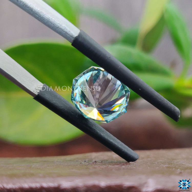 2.81 carat moissanite brilliance with cyan blue moissanite tone.