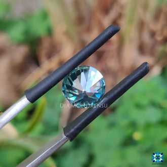 Green round old european cut provided as a moissanite loose stone.