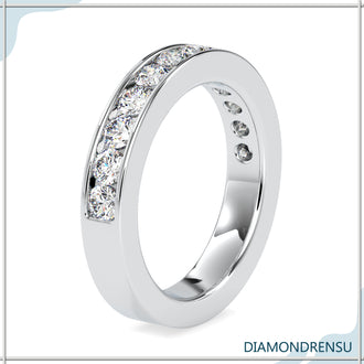 Channel ring in yellow gold featuring lab grown diamond stones