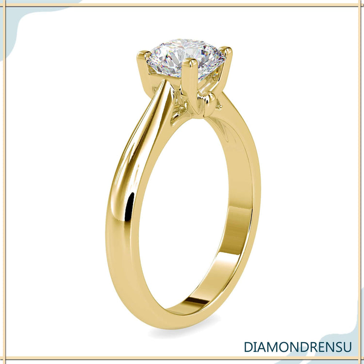 Round solitaire ring offering timeless beauty and radiant sparkle.