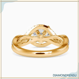 Round brilliant cut diamond ring in a 4 prong round engagement ring setting with a unique design.