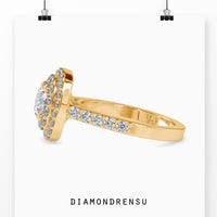 2 carat round diamond ring with a shared prong engagement setting.