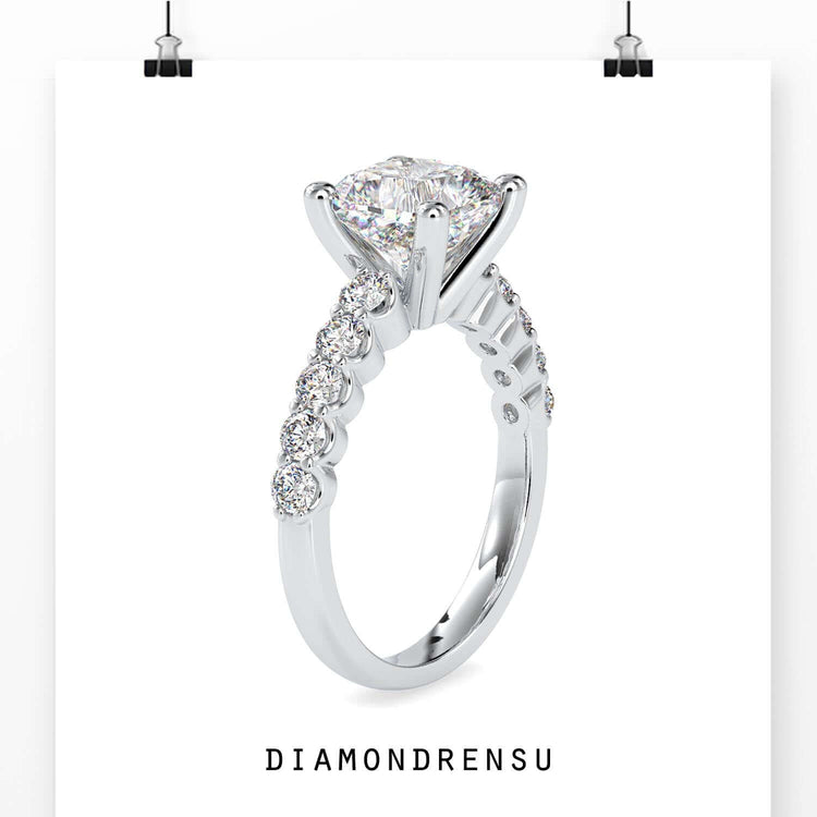 Halo diamond ring featuring an oval diamond in 4 prong engagement ring