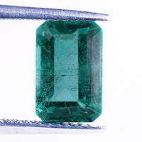Natural emerald gemstone paired with emerald shape gemstone.