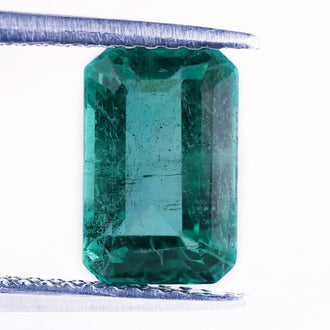 Natural emerald gemstone paired with emerald shape gemstone.