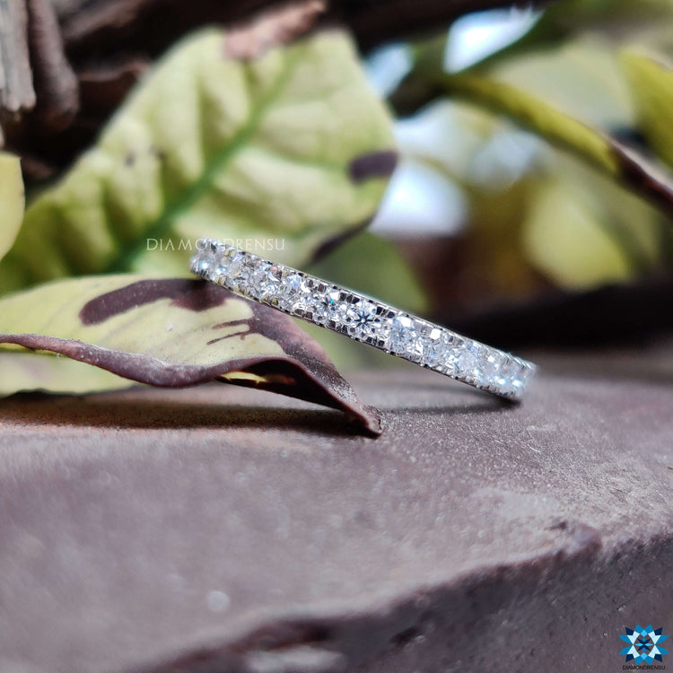 Shared prong wedding band in a classic full eternity style.