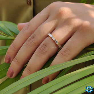 Moissanite baguette band with a sophisticated finish.