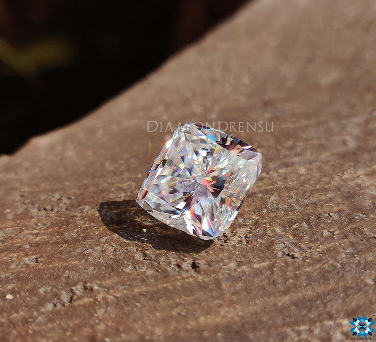 Colorless cushion cut moissanite weighing 5.18 carat, sold as a moissanite loose stone.