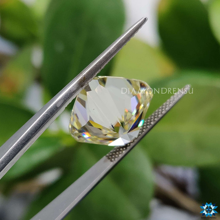 Moissanite Cushion Cut shaped into earrings made with loose Moissanite stone from Diamondrensu.