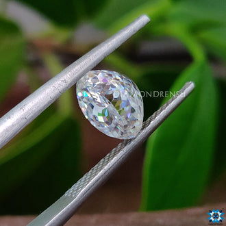 2 carat Moissanite styled in antique cut used for vintage-inspired drop earrings.