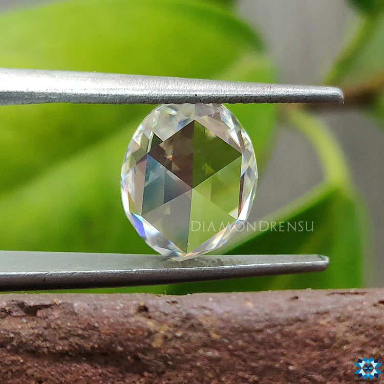 Moissanite stone shaped as Oval Rose Cut Moissanite for antique-inspired ring settings.