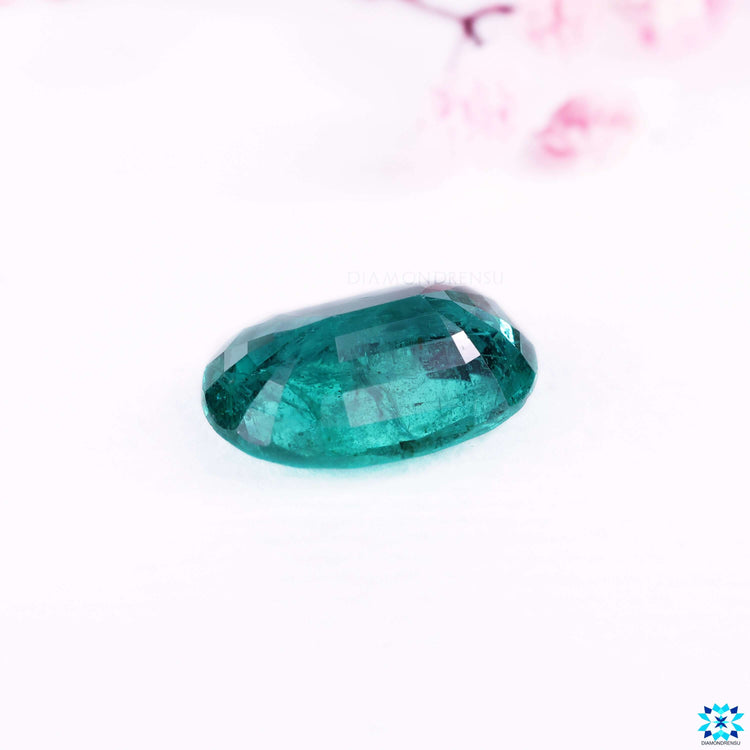 May birthstone emerald in oval gemstone cut.