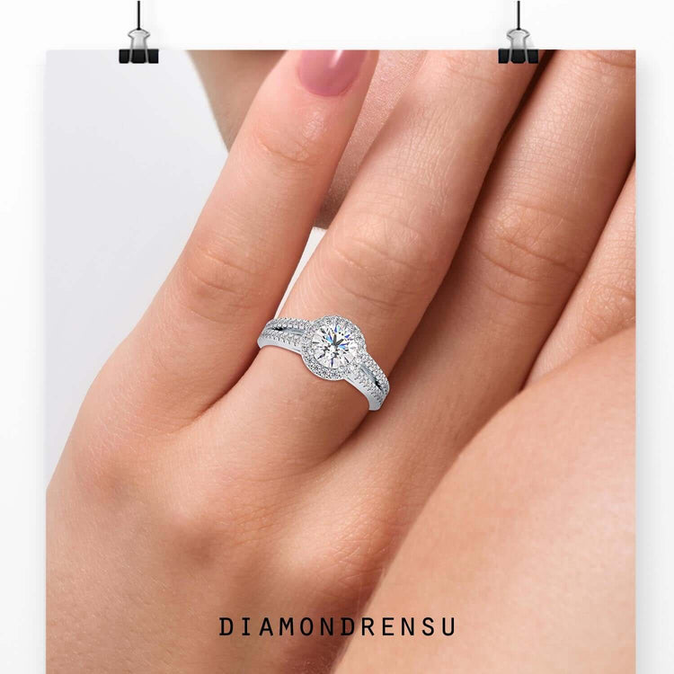 Split band engagement ring with a round halo diamond and pave accents, IGI certified.