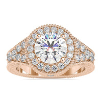 Split shank ring featuring a stunning round cut diamond for timeless elegance.