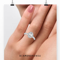 Three stone emerald cut diamond ring in prong setting design