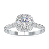 Round halo engagement ring with timeless elegance and sparkling diamonds.