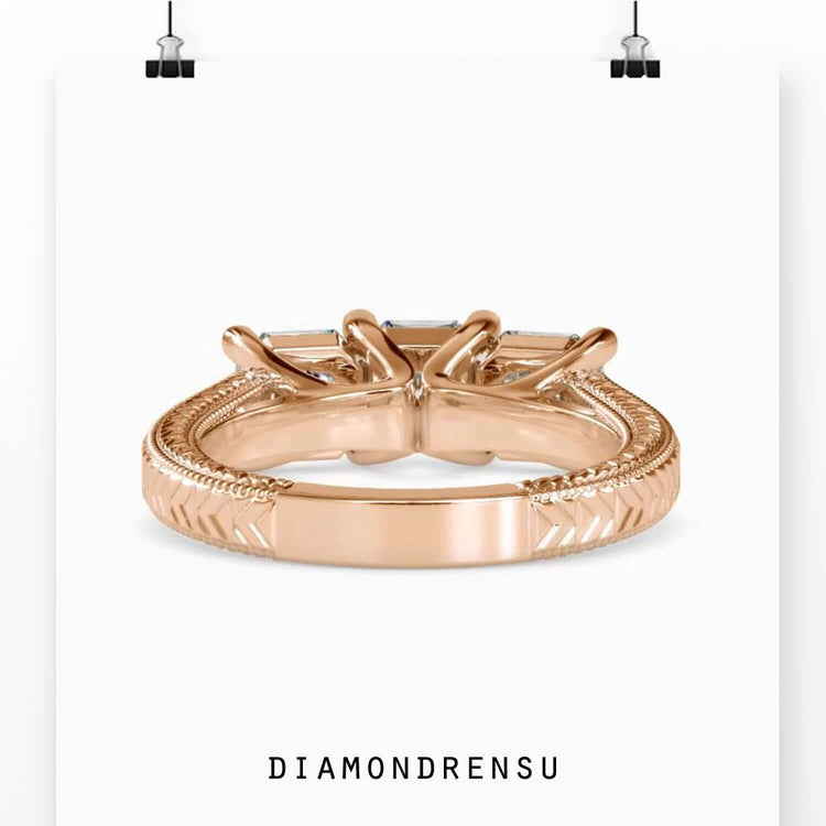 Lab grown diamond ring with three stone design in yellow gold.