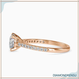 Gold pave ring with a cathedral setting and a round diamond, designed by DiamondRensu.